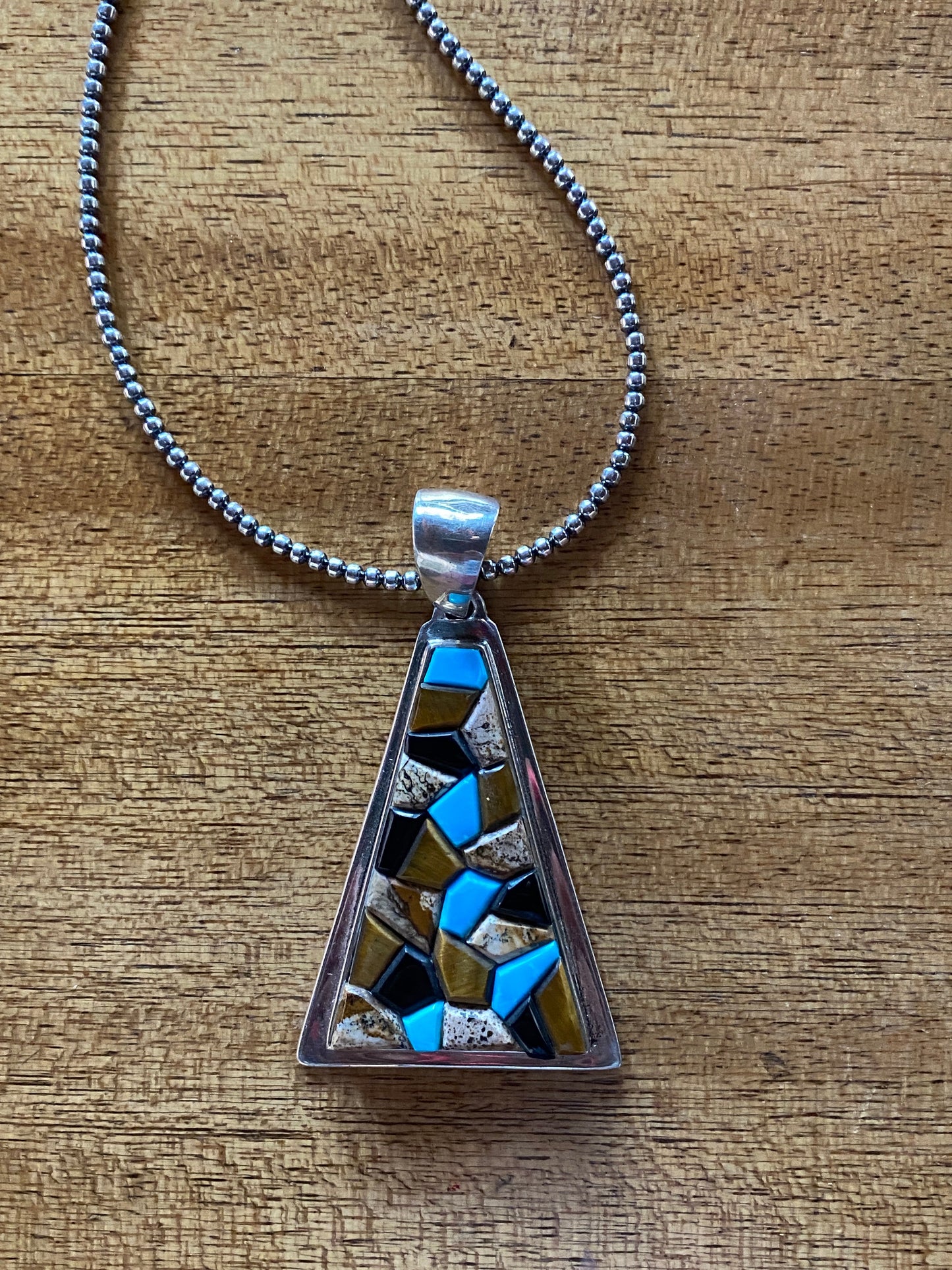 Navajo Rolled Turquoise, Petrified Wood, Onyx & Sterling Silver Pendant