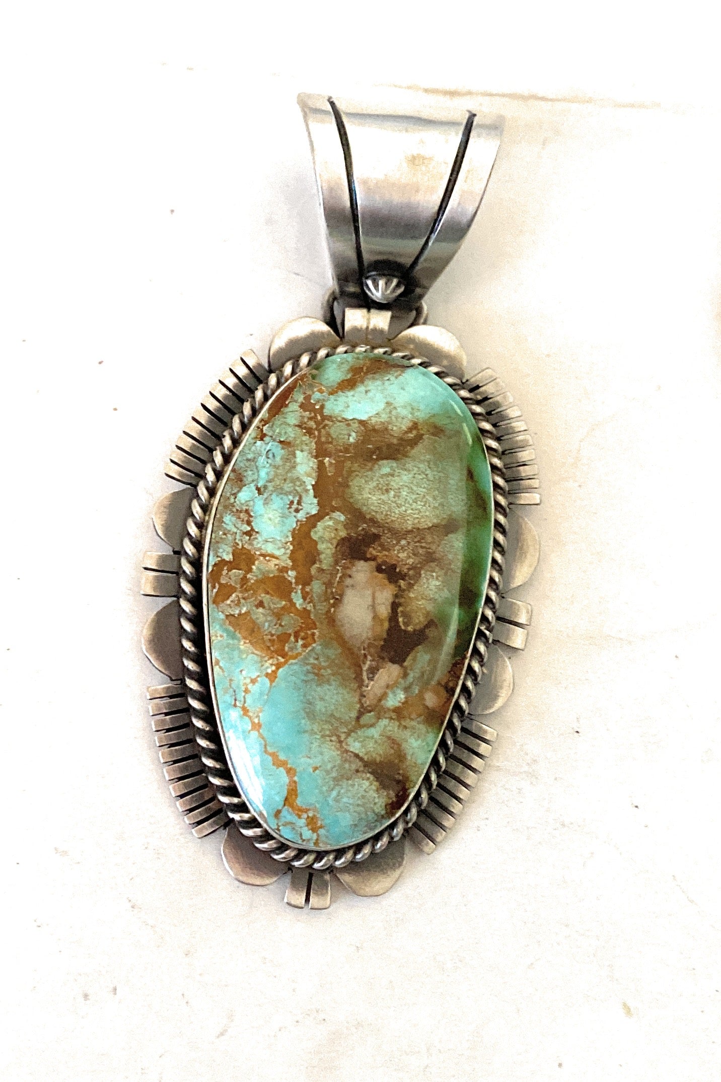 Navajo Royston Turquoise and Sterling Silver Pendant by Russell Sam