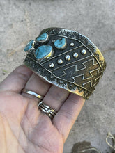 Load image into Gallery viewer, Navajo Turquoise &amp; Sterling Silver Tufa Cast Tribal Cuff Signed Delbert Arviso