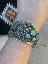 Load image into Gallery viewer, Navajo Turquoise &amp; Sterling Silver Tufa Cast Tribal Cuff Signed Delbert Arviso
