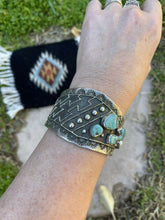 Load image into Gallery viewer, Navajo Turquoise &amp; Sterling Silver Tufa Cast Tribal Cuff Signed Delbert Arviso