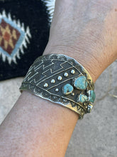 Load image into Gallery viewer, Navajo Turquoise &amp; Sterling Silver Tufa Cast Tribal Cuff Signed Delbert Arviso